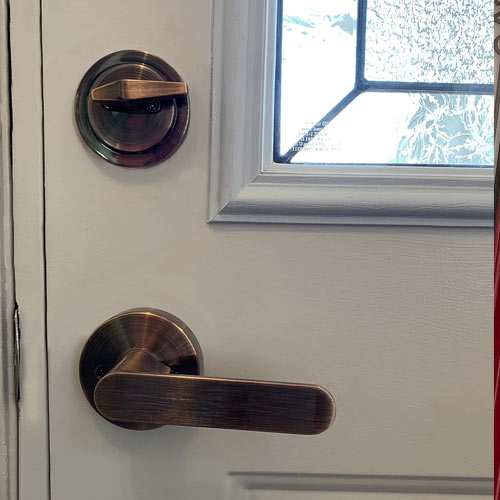 Reversible Front Door Hardware Set Luna with Lever Handle and deadbolt. European Style. Antique Copper.
